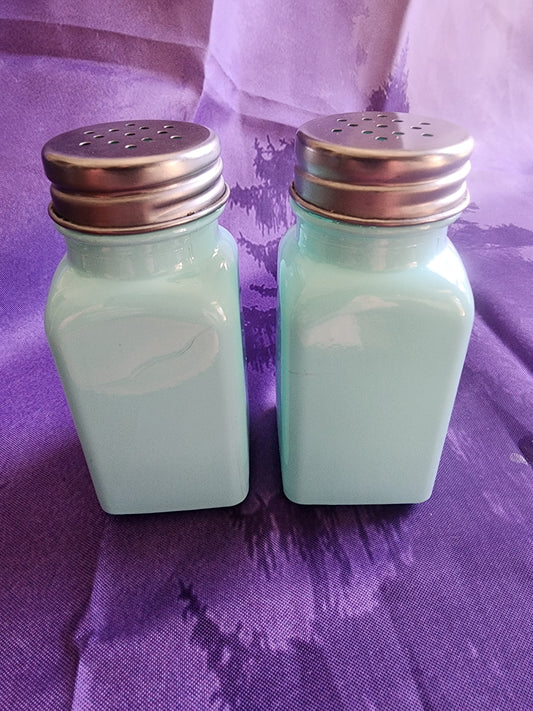 Salt &  Pepper Shakers Turquoise Glass and stainless steel tops.
