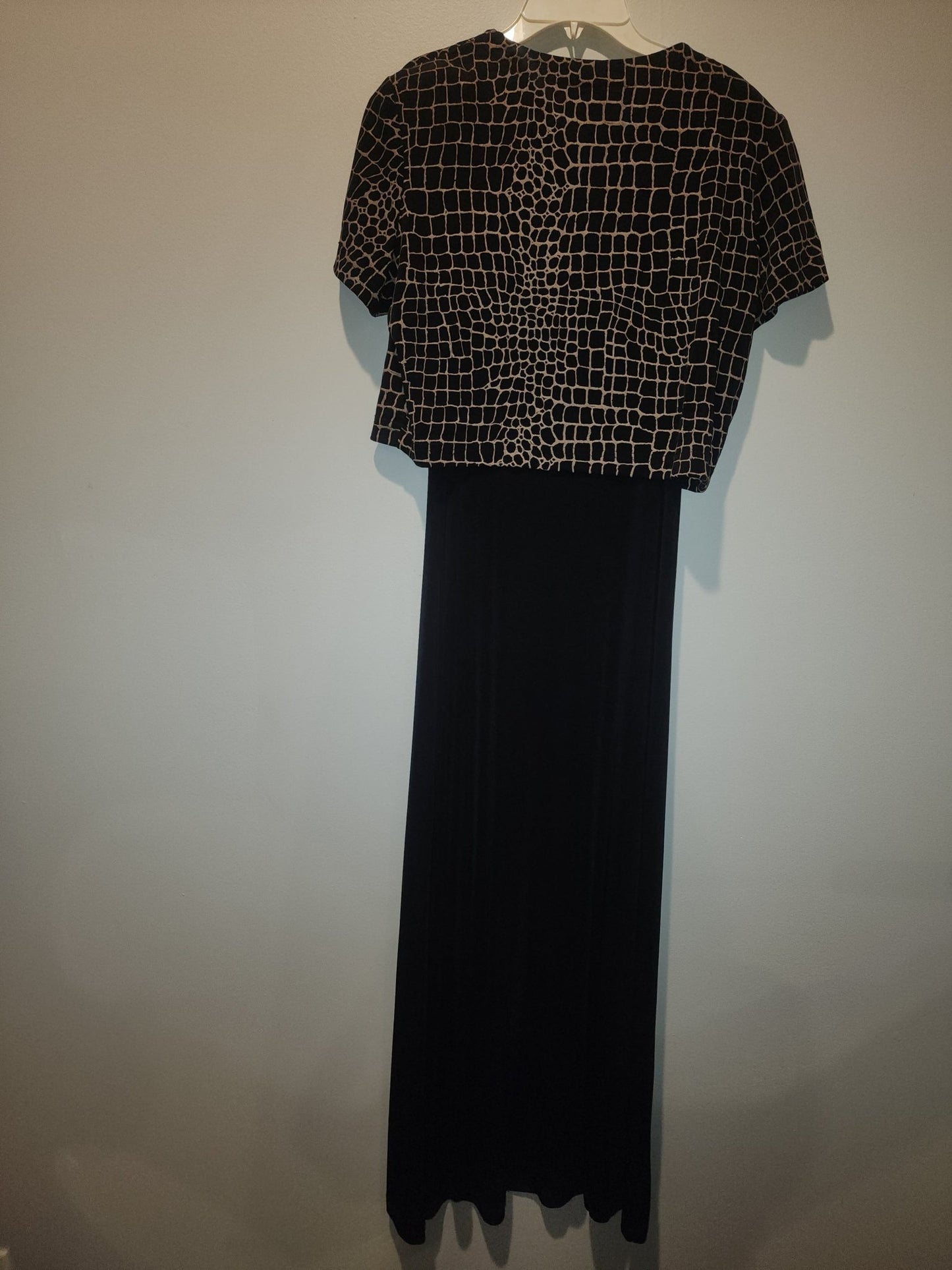 Black maxi dress paired with a short - sleeved top featuring a Giraffe Pattern M - I Bought a Yard Sale