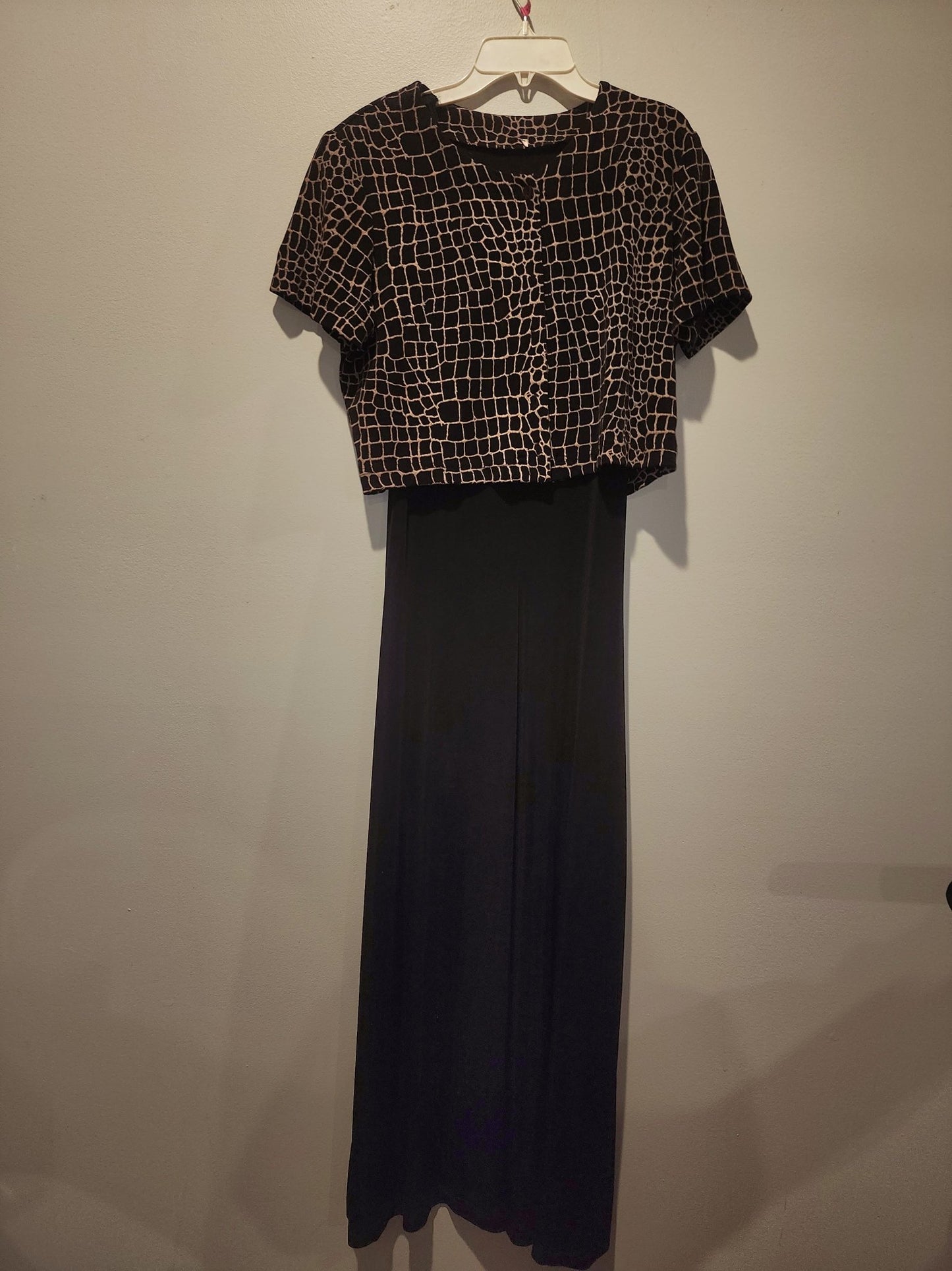 Black maxi dress paired with a short - sleeved top featuring a Giraffe Pattern M - I Bought a Yard Sale