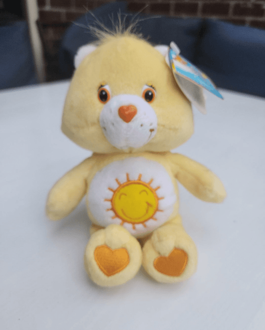 Care Bear 8" Funshine sunshine plush bear in good condition - I Bought a Yard Sale