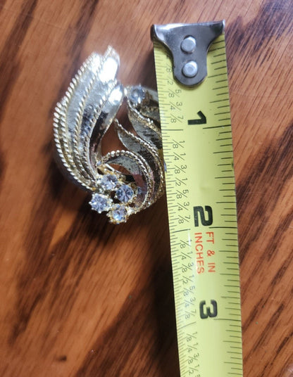 Elegant gold - tone Scarf Clip features sparkling rhinestones and a unique design - I Bought a Yard Sale