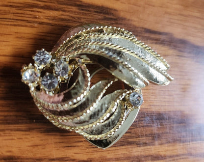 Elegant gold - tone Scarf Clip features sparkling rhinestones and a unique design - I Bought a Yard Sale