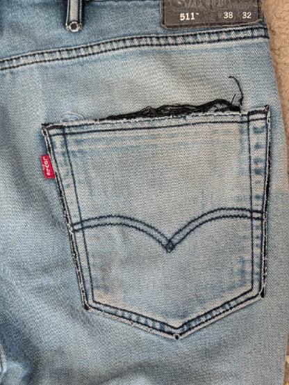 Vintage Levi's 511 Light Blue Distressed Slim Straight Jeans 38x32