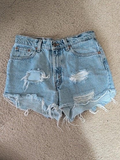 Vintage Levi's Light Blue Distressed Denim Cut-Off Shorts Women's 10