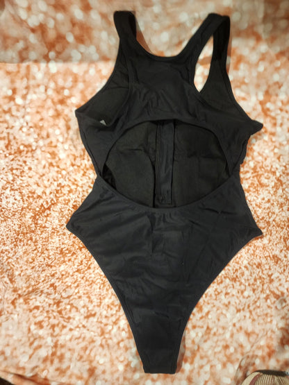 Sleek and stylish black one - piece swimsuit, perfect for the beach or pool L - I Bought a Yard Sale