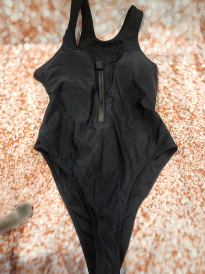 Sleek and stylish black one - piece swimsuit, perfect for the beach or pool L - I Bought a Yard Sale