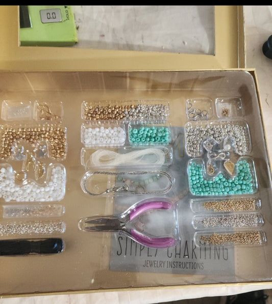 STMT DIY Jewelry kit as shown in photo with beads and charms. - I Bought a Yard Sale