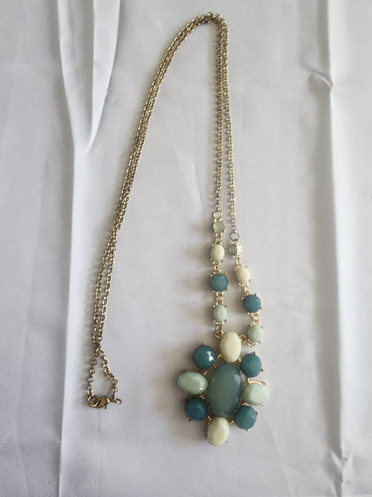 This vintage necklace features a stunning cluster of teal and cream stones - I Bought a Yard Sale