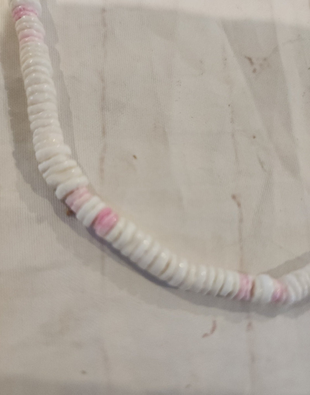 Vintage Puka shell necklace brings the island vibes! Features white and pink shells on a 17" strand - I Bought a Yard Sale