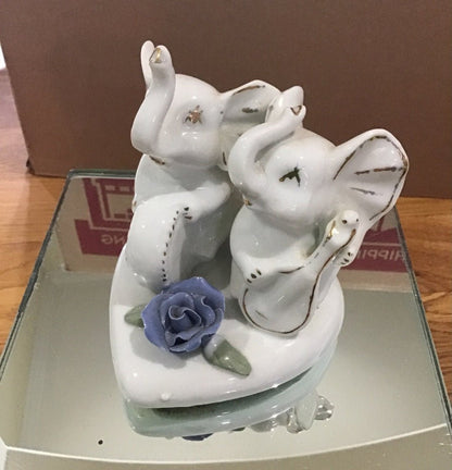 Vintage Victorian 2 sets of Porcelain Elephants on heart base with rose accents - I Bought a Yard Sale