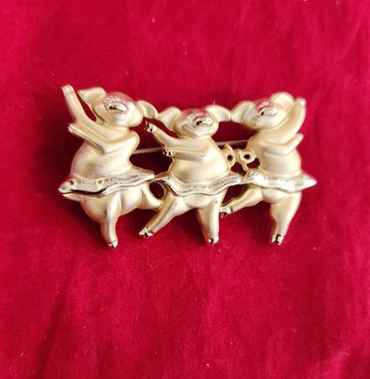 Whimsical Dancing Pigs Pin! This charming gold - tone brooch - I Bought a Yard Sale