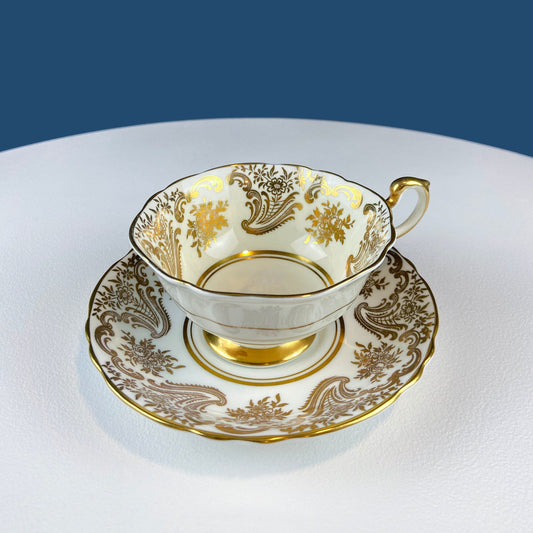 White and Gold Cup and Saucer. Paragon Porcelain, By Appointment to Her Majesty the Queen Potters. Dining Room Cabinet Display. - I Bought a Yard Sale